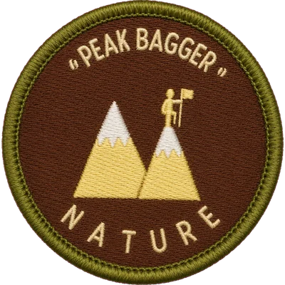 Embroidered Nature patch — twin snow-capped peaks with a summiteer planting a flag