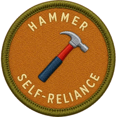 Embroidered Self-Reliance patch — a claw hammer with a red and blue handle on ochre